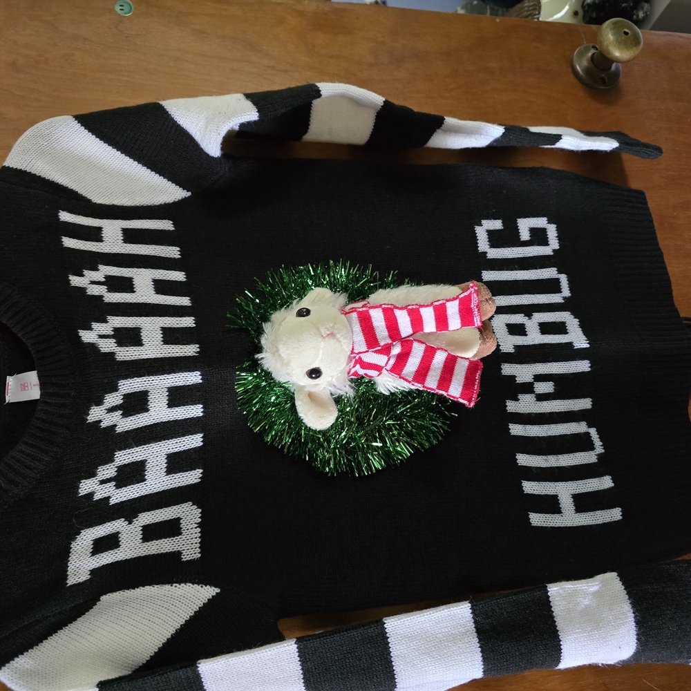 No Boundaries Black and White Sweater with Festive Design